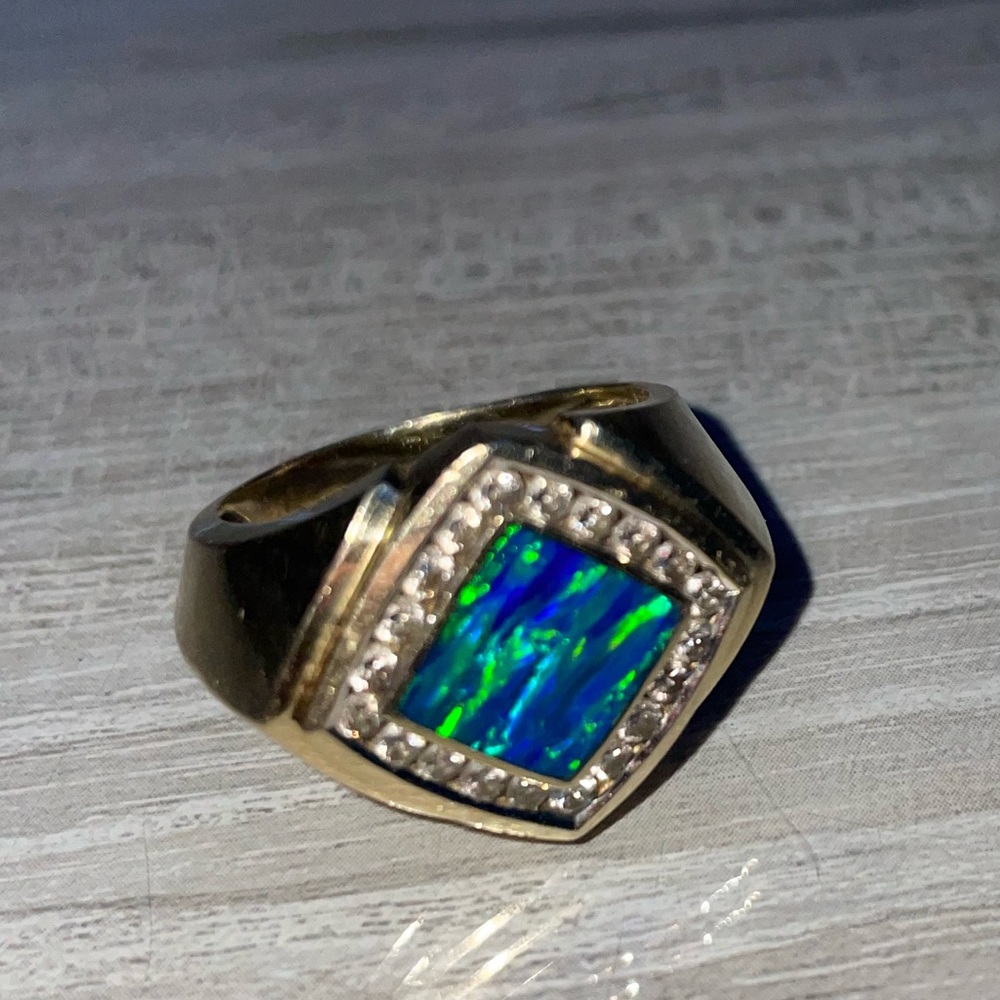 14k gold ring with blue opal and 1 Karat of diamonds